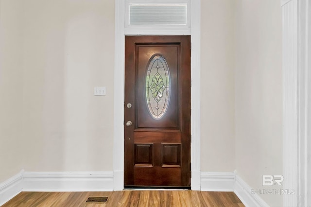property entrance with visible vents