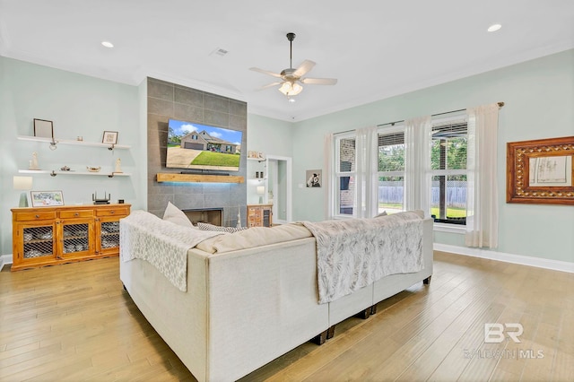 30635 Drayton Ct, Spanish Fort, AL 36527 - living room featuring a fireplace, light wood-type flooring, a ceiling fan, baseboards, and recessed lighting