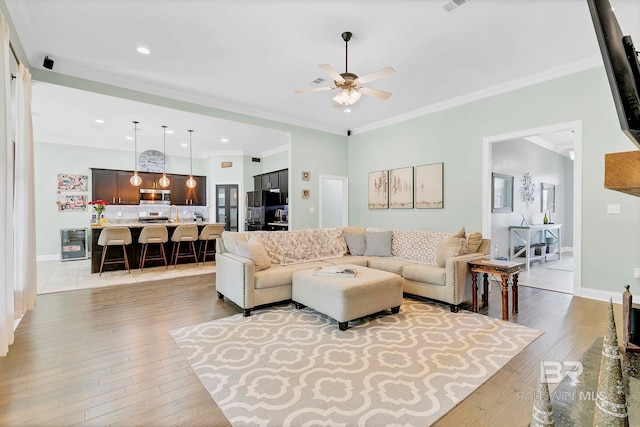 30635 Drayton Ct, Spanish Fort, AL 36527 - living room with ceiling fan, hardwood / wood-style flooring, crown molding, baseboards, and recessed lighting