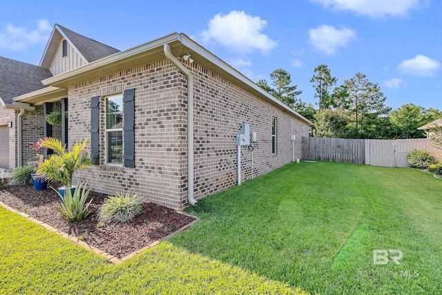 30635 Drayton Ct, Spanish Fort, AL 36527 - view of property exterior with brick siding, board and batten siding, and a garage