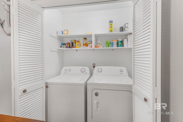 laundry area with washer and clothes dryer