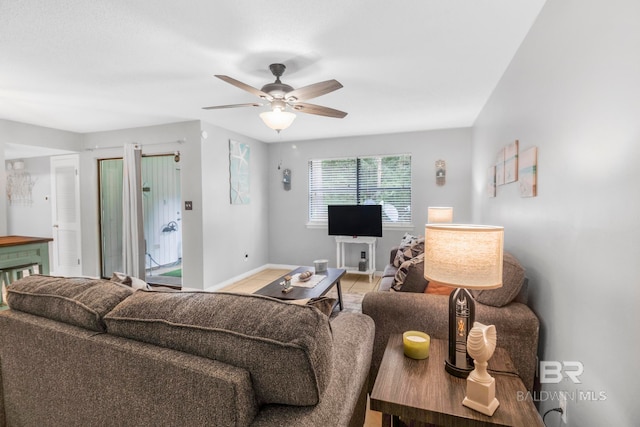 living room featuring ceiling fan