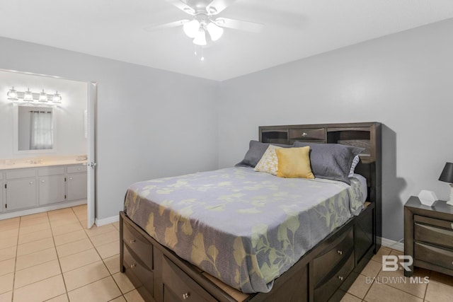 bedroom with ceiling fan and light tile patterned flooring