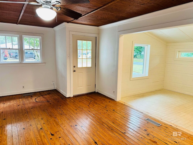 entrance foyer featuring wood ceiling, ceiling fan, vaulted ceiling, and hardwood / wood-style floors