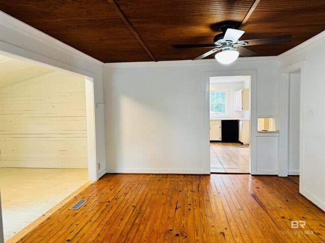 unfurnished room with crown molding, ceiling fan, wooden ceiling, and light hardwood / wood-style floors