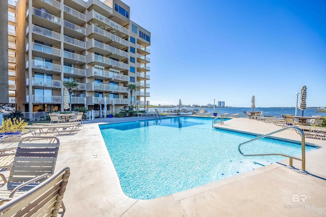 community pool featuring a patio