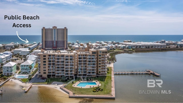 drone / aerial view with a water view