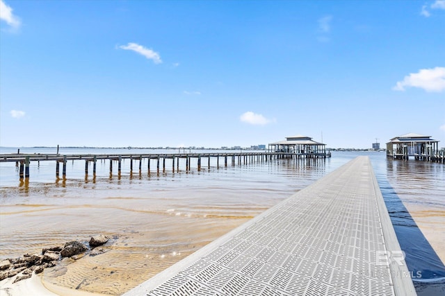 view of dock with a water view