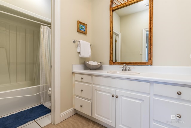 full bathroom with vanity, toilet, tile patterned floors, and shower / tub combo