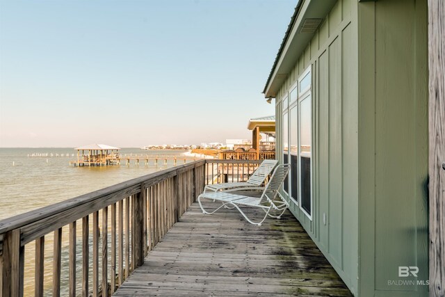 deck at dusk with a water view