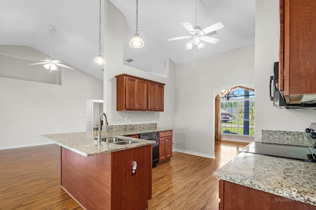 kitchen featuring dishwasher, sink, high vaulted ceiling, ceiling fan, and light stone counters