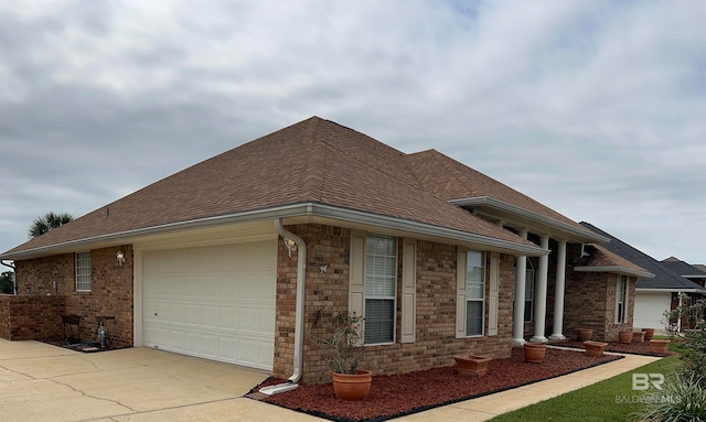 view of property exterior with a garage