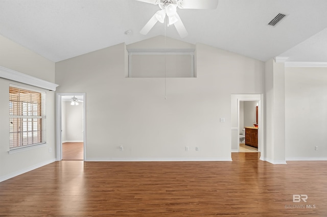 421 Collinwood Loop, Foley, AL 36535 - unfurnished living room with high vaulted ceiling, ceiling fan, wood finished floors, and visible vents