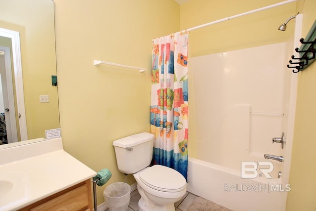 bathroom with vanity, toilet, and shower / bath combo with shower curtain