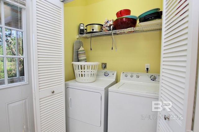 washroom with laundry area and washing machine and dryer