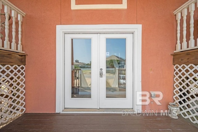 doorway to property featuring french doors