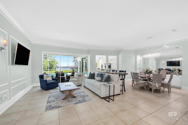 8160 Bay View Dr, Foley, AL 36535 - living area featuring light tile patterned floors, ornamental molding, and baseboards