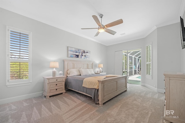 8160 Bay View Dr, Foley, AL 36535 - bedroom with access to outside, light carpet, baseboards, crown molding, and a ceiling fan
