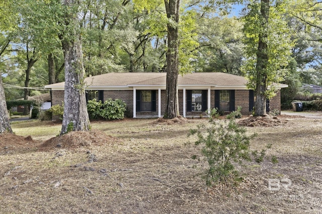 ranch-style house featuring a porch