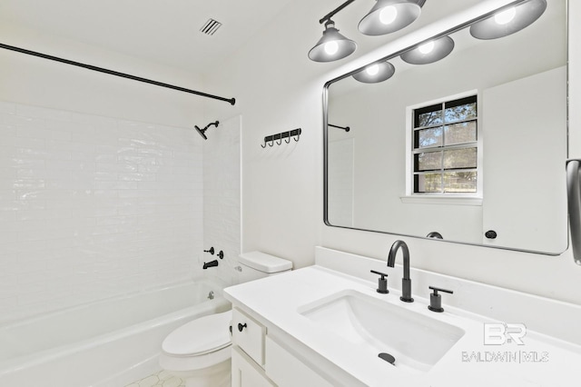 full bathroom featuring toilet, vanity, and bathing tub / shower combination