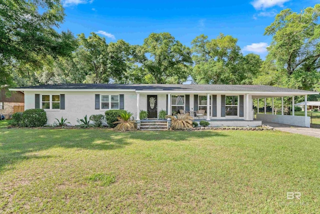 120 E Bayou Ave, Satsuma, AL 36572 - ranch-style house featuring a carport, a front lawn, and driveway