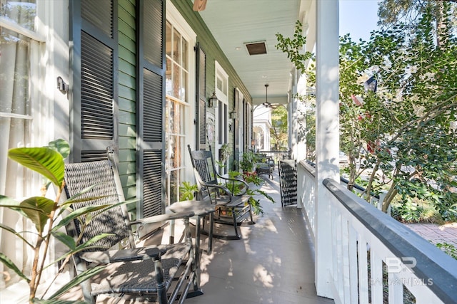 balcony featuring covered porch