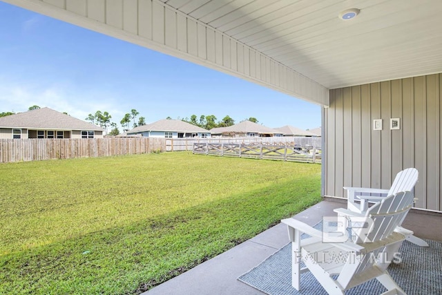 view of yard with a fenced backyard and a patio area
