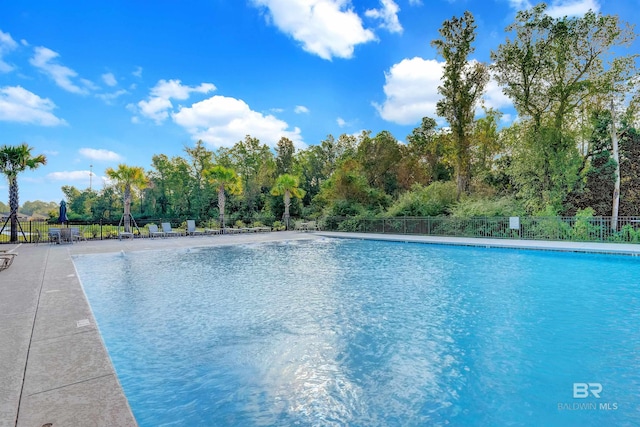 pool featuring fence