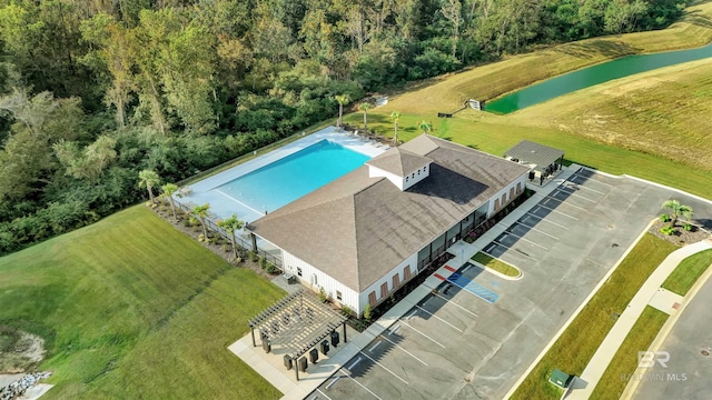 bird's eye view with a water view
