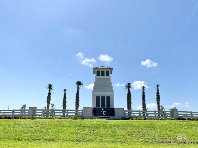 view of property's community with fence