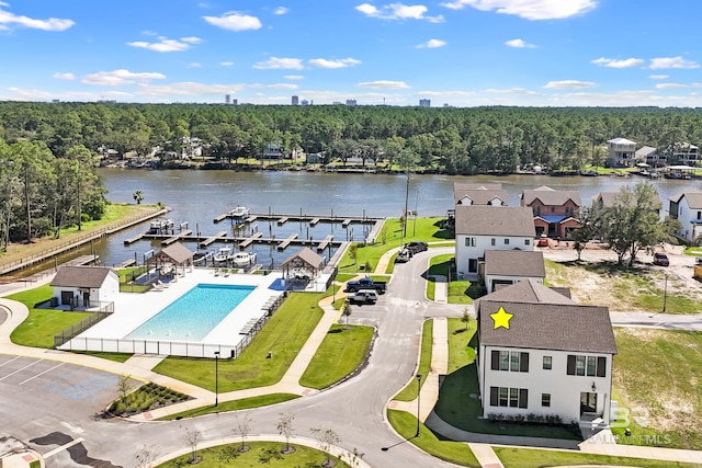 birds eye view of property featuring a water view