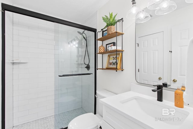 5100 Pine Way, Orange Beach, AL 36561 - bathroom with a tile shower, toilet, and vanity
