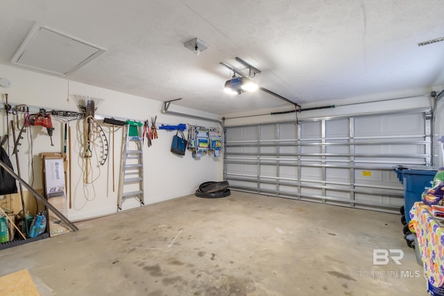 5100 Pine Way, Orange Beach, AL 36561 - garage featuring a garage door opener
