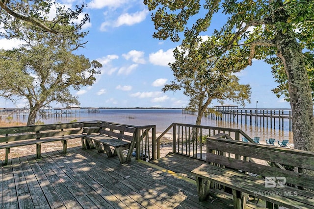 deck featuring a water view