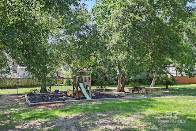 view of yard with a playground