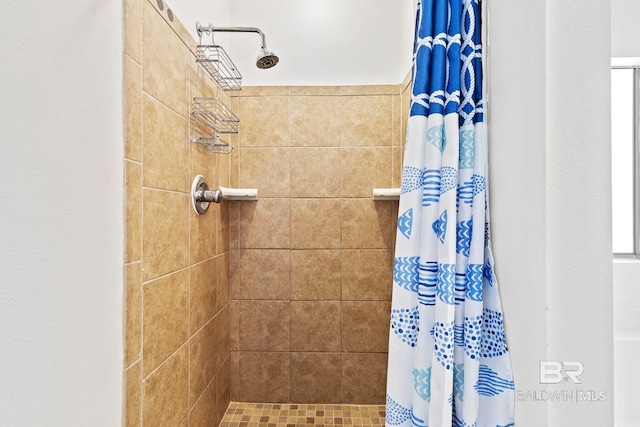 bathroom featuring a shower with curtain