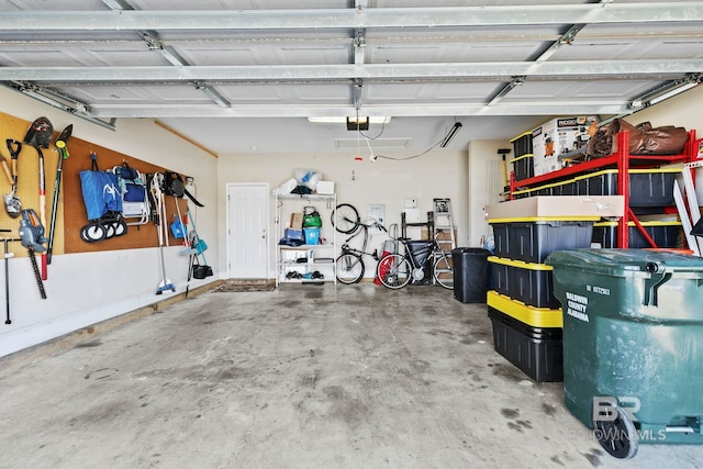 garage featuring a garage door opener