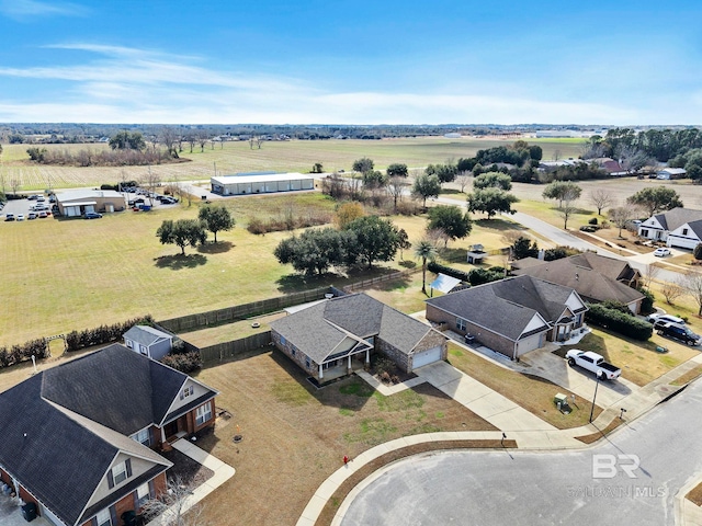 birds eye view of property featuring a rural view