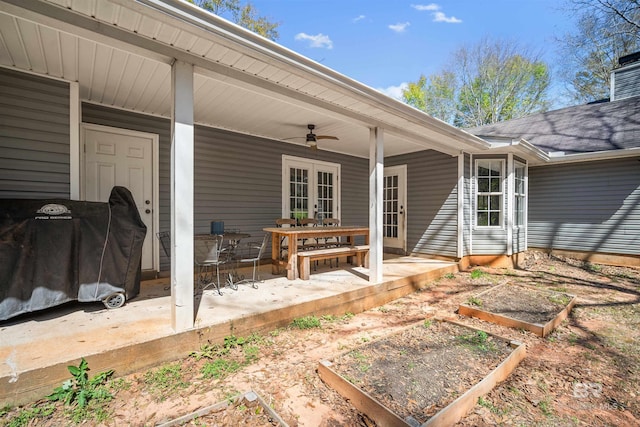 view of patio / terrace featuring area for grilling, a garden, french doors, and ceiling fan