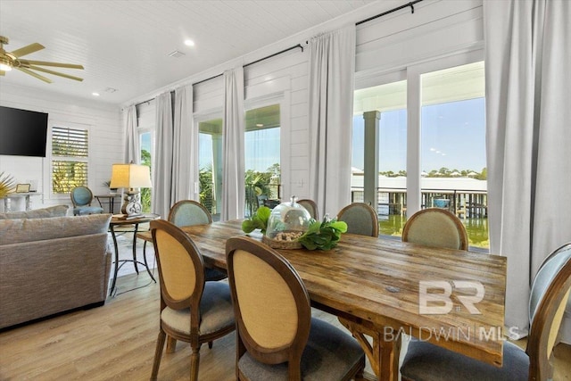 dining room featuring recessed lighting and light wood finished floors