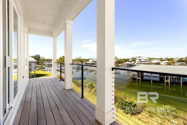 balcony featuring a water view