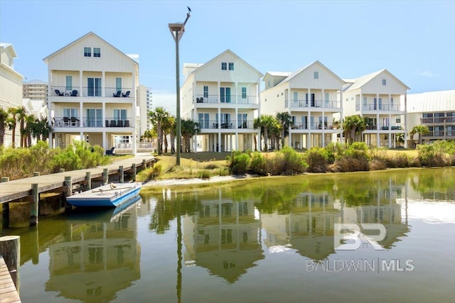 dock area featuring a water view