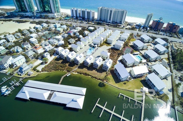 bird's eye view featuring a city view and a water view