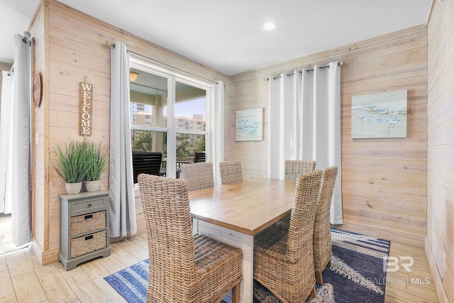 487 E 1st Ave Unit F, Gulf Shores, AL 36542 - dining area with wooden walls, light wood-type flooring, and recessed lighting
