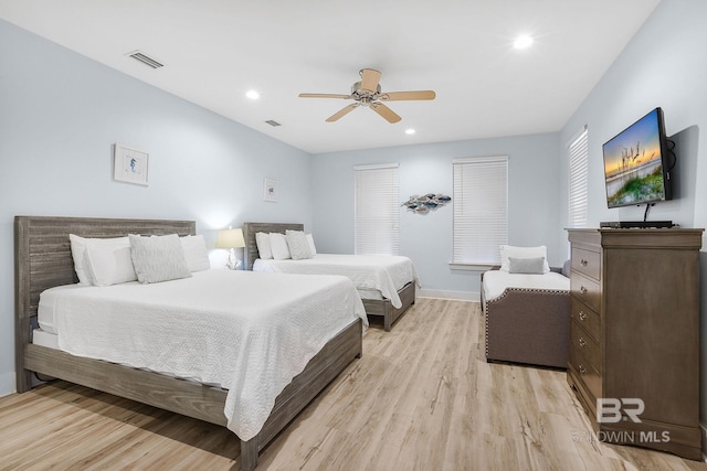 487 E 1st Ave Unit F, Gulf Shores, AL 36542 - bedroom featuring baseboards, recessed lighting, a ceiling fan, light wood-style floors, and visible vents