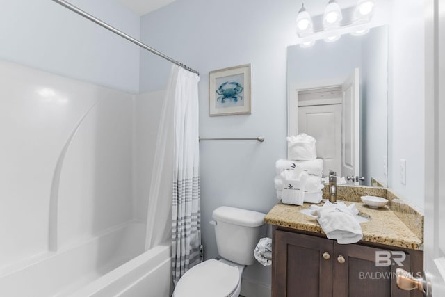 487 E 1st Ave Unit F, Gulf Shores, AL 36542 - bathroom with toilet, shower / tub combo with curtain, and vanity