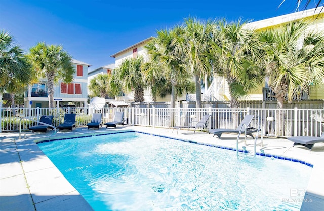 487 E 1st Ave Unit F, Gulf Shores, AL 36542 - pool with a patio and fence
