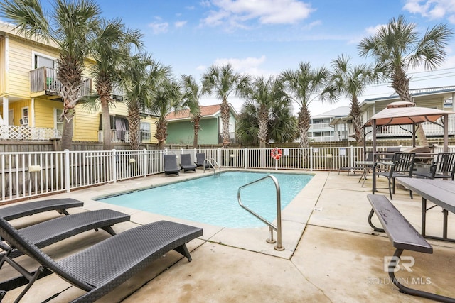 487 E 1st Ave Unit F, Gulf Shores, AL 36542 - pool with fence and a patio