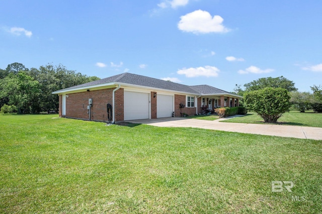 ranch-style house with a garage and a front lawn