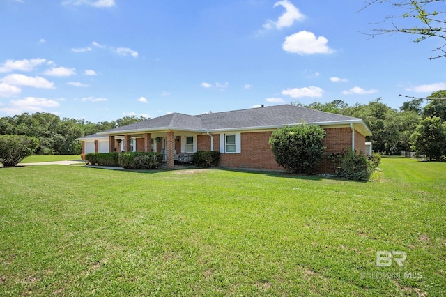 ranch-style house featuring a front lawn